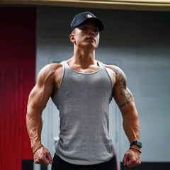 Men's sleeveless quick drying sports vest American solid color nylon breathable fitness vest shoulder strong elasticity moisture wicking and sweat wicking
