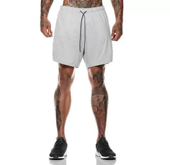 Solid color new sports pants men's mid length pants five quarter length pants fitness pants quick drying breathable elastic muscle shorts trendy plus size